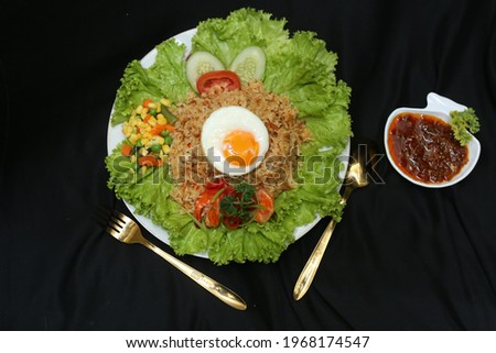 fried rice with egg in the middle