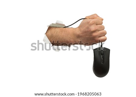 computer mouse in hand breaking through the background