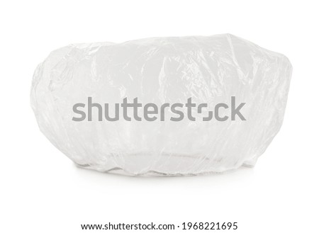 Transparent waterproof shower cap on white background Royalty-Free Stock Photo #1968221695