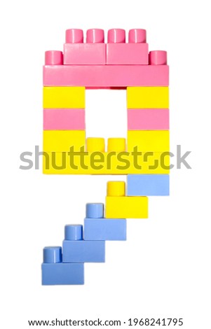 Number nine made of colorful blocks of the toy designer isolated on the white background