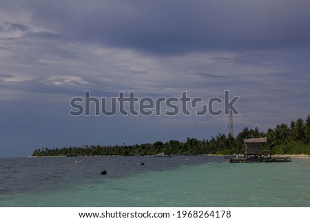 a house made of bamboo or wood in the middle of the sea to catch fish on kayangel island, palau, micronesia.