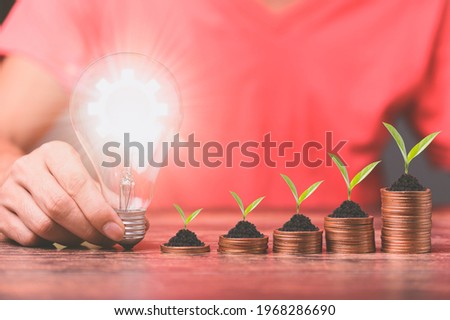  light bulb And there is a gear icon Investment and business growth stock