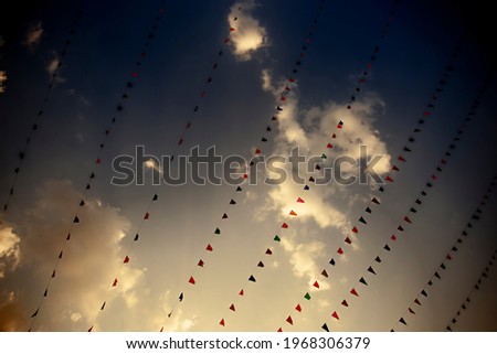 Line flags with blue sky for background