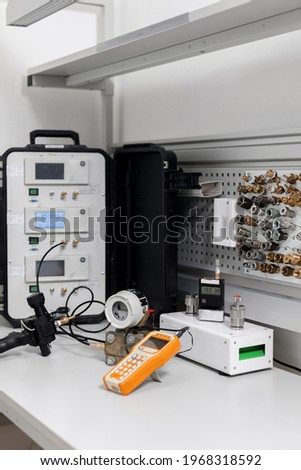 Standart gas pressure transmitter of portable calibrator. tools for checking the calibration of calibrators against a standard. Royalty-Free Stock Photo #1968318592