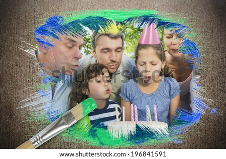 Composite image of family celebrating a birthday with paintbrush dipped in green against weathered surface