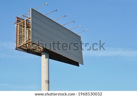 big blank billboard on blue sky background