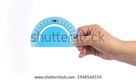 woman's hand holding a protractor. Isolated on white background.
