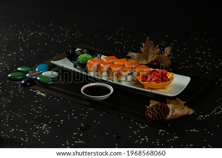 Cool Hot Sushi rolls on black slate