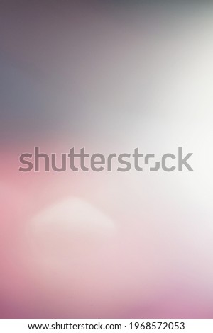 Pink-gray abstract background with bokeh .Vertical picture.
