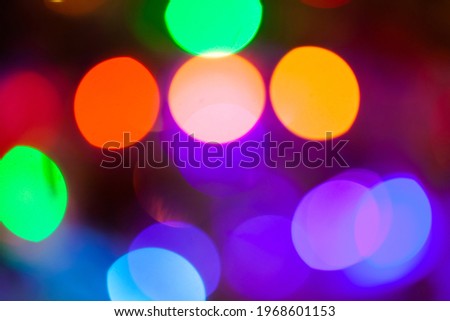 New Years blurr garland with blurry background, used as a background or texture, soft focus