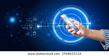 Man's hand using smartphone to connecting data information and communication online. Panoramic banner of networking technology and social media with copy space