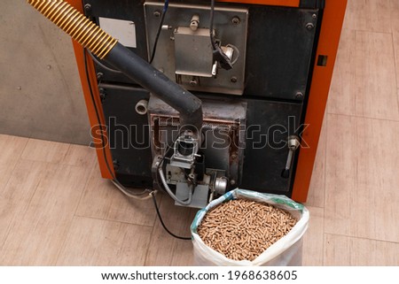 Picture of an automatic pellet burner system