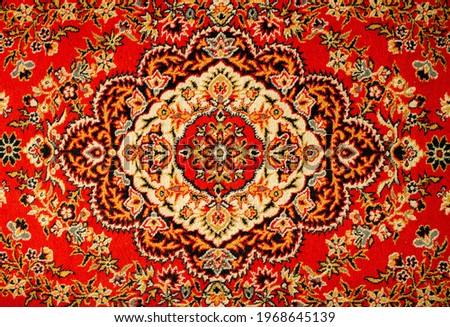 Wall carpet. Red carpet with an abstract pattern. Retro interior. Design of apartments in the USSR. Royalty-Free Stock Photo #1968645139