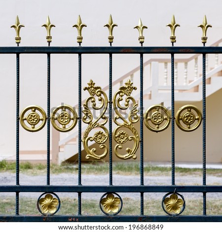 Metal fence of the fittings with a pattern