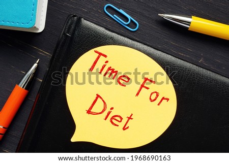Financial concept about Time For Diet with phrase on the piece of paper. 
