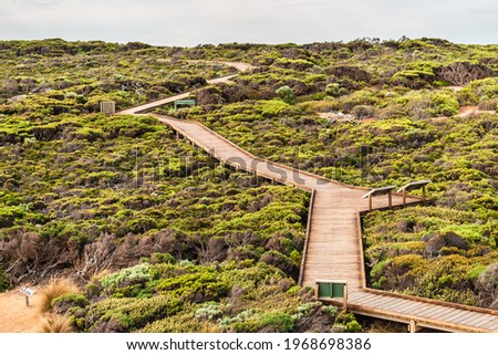 Remarkable Rocks boardwalk viewed towards the carpark from the lookout on a day, Flinders Chase National Park, South Australia