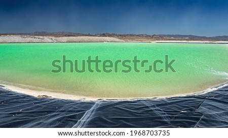 Lithium Mine - Carbonate from Evaporation Ponds Mined in Nevada Desert - Shallow Depth of Field Royalty-Free Stock Photo #1968703735