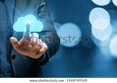 Cloud service and storage concept with businessman finger on digital touch screen with cloud icon
