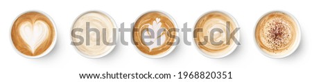 Set of paper take away cups of different coffee latte or cappuccino isolated on white background, top view Royalty-Free Stock Photo #1968820351