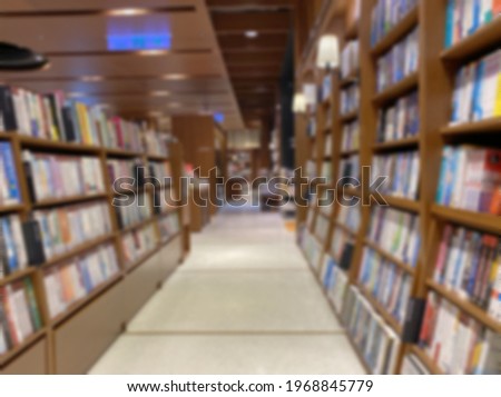 Blur image of bookshelf. Empty bookstore or college or library concept photo.