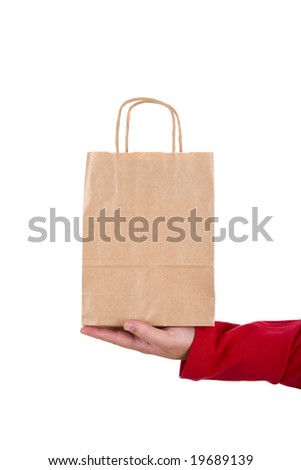 man hand holding paper bag isolated on white