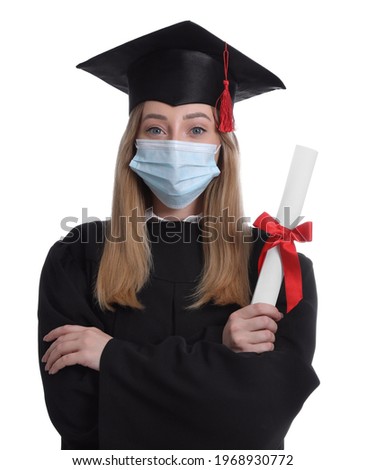 Student in protective mask with diploma on white background