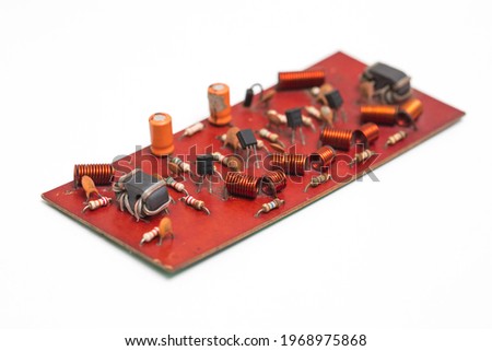 Circuit board stock photo isolated on white background. Angle view. 
