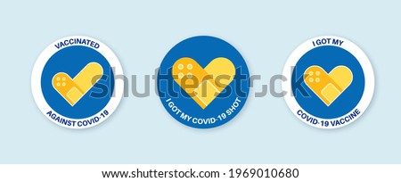 Vaccination round badges with quote - I got covid 19 vaccine, i got my covid-19 shot, vaccinated against covid-19. Coronavirus vaccine stickers with medical plaster as heart symbol Vector illustration Royalty-Free Stock Photo #1969010680