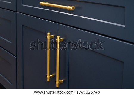 kitchen door handles cabinet furniture interior style steel shiny Royalty-Free Stock Photo #1969026748