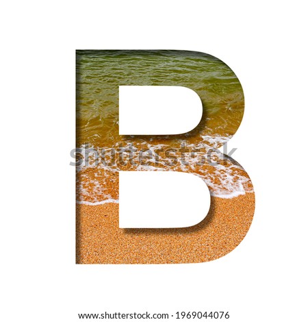 Sea shore font. The letter B cut out of paper on a background of the beach of seashore with coarse sand and emerald water. Set of decorative natural fonts.