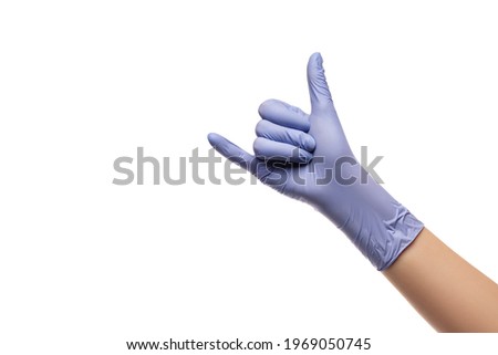 Hands in blue gloves on a white background. Hang loose or shaka sign.