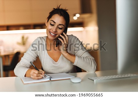 Woman resting at home, making some plans, enjoying in the afternoon.