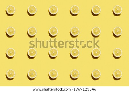 Yellow pattern with lemon. Fresh citrus fruit slices. Minimalistic food concept 