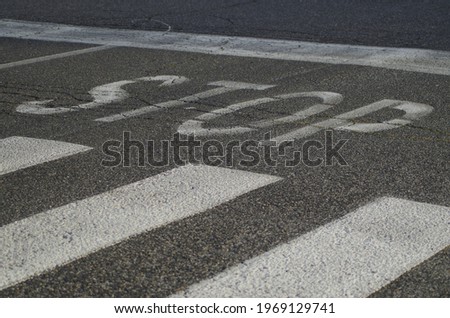 Stop road sign on the asphalt