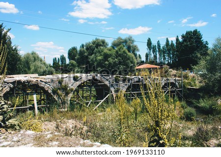It is a historical bridge in Çavdarhisar. The historical bridge in the ancient city of Aizanoi. Thousands of years old stone bridge. Selective focus bridge.