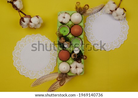 space for insertion with white napkins and Easter decor on a light background horizontally