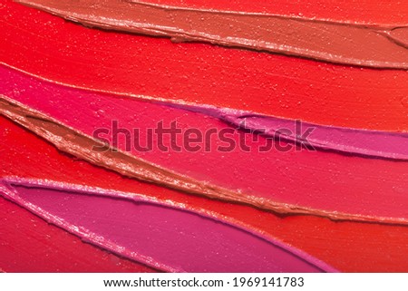 Lip gloss pink red smudge background