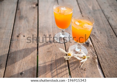 fresh orange juice on wooden table