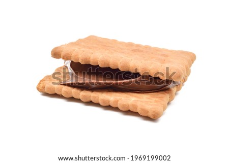 Biscuit sandwich with hazelnut chocolate cream isolated on white background