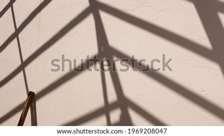 symmetry sun shadows wall nature