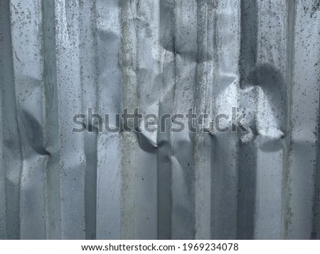 texture and background of damaged corrugated metal fence