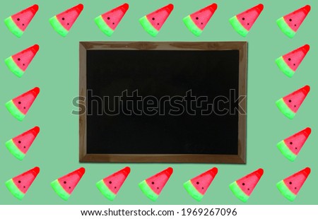 Made design blackboard composition with water melon ice cream frame on green background, stock photo, flat lay, top veiw