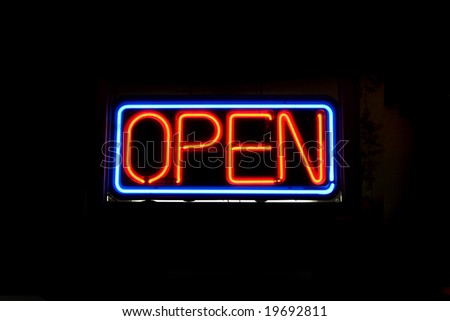A neon OPEN sign commonly seen in businesses.