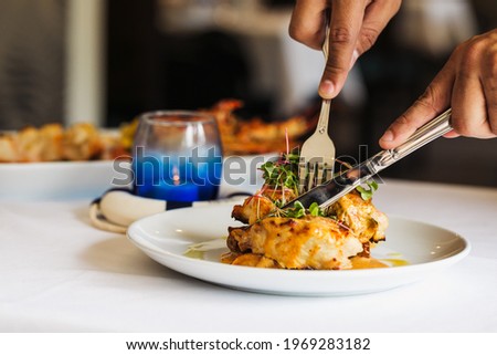 A nautical-based fine dining experience with lobster Royalty-Free Stock Photo #1969283182