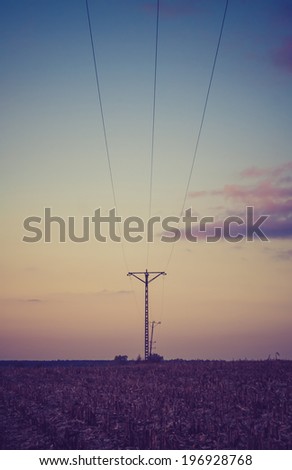 vintage photo of rural landscape with plowed field