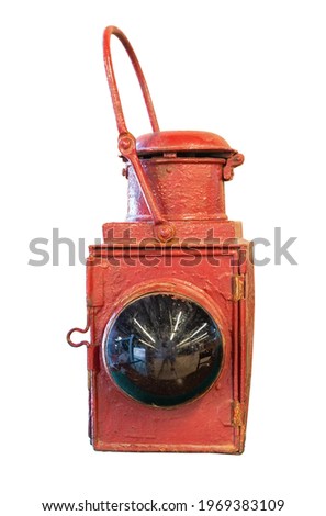 Old, red, railway lantern isolated on white background