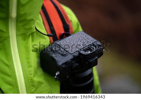 Landscape photographer with a waterproof DSLR