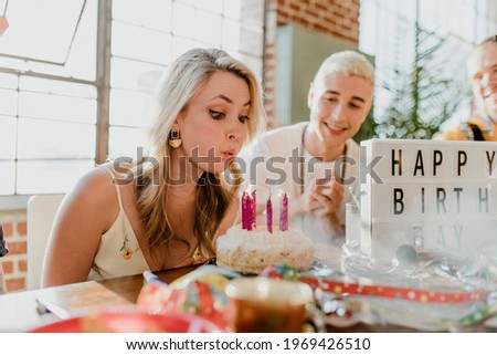Blowing out the candles on a birthday cake