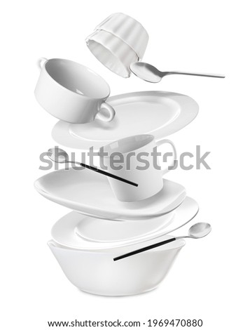 Flying clean tableware on white background Royalty-Free Stock Photo #1969470880