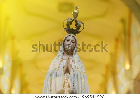 Statue of the image of Our Lady of Fatima, mother of God in the Catholic religion, Our Lady of the Rosary of Fatima, Virgin Mary Royalty-Free Stock Photo #1969511596